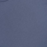 A close-up of the SUNSPEL Short Sleeve Classic T-Shirt in blue, laid flat to highlight its smooth cotton texture, round neckline, and visible size tag near the top left.