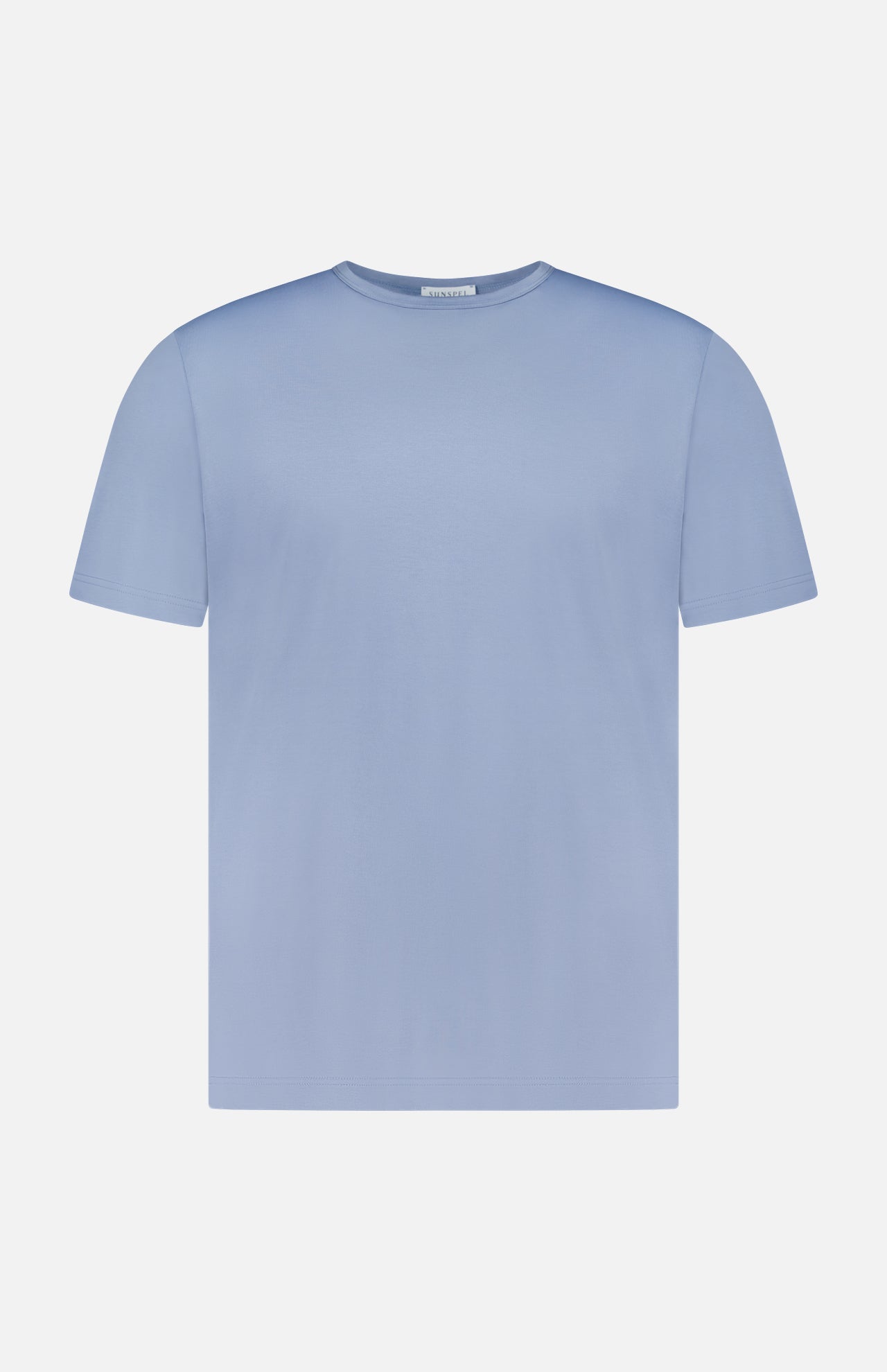 The SUNSPEL Short Sleeve Classic T-Shirt is presented against a white background. Crafted in England from light blue cotton, this plain tee delivers timeless style and comfort.