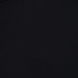 Close-up of the SUNSPEL Superfine Underwear T-Shirt in plain black, highlighting the crew neck and a small portion of a white label at the upper left. Made from premium long staple cotton, this essential piece is an ideal addition to men’s loungewear collections.