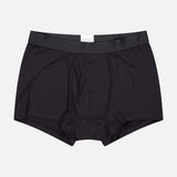 The SUNSPEL Superfine Trunk for men features black cotton jersey, a waistband, and visible seams, shown on a plain white background.