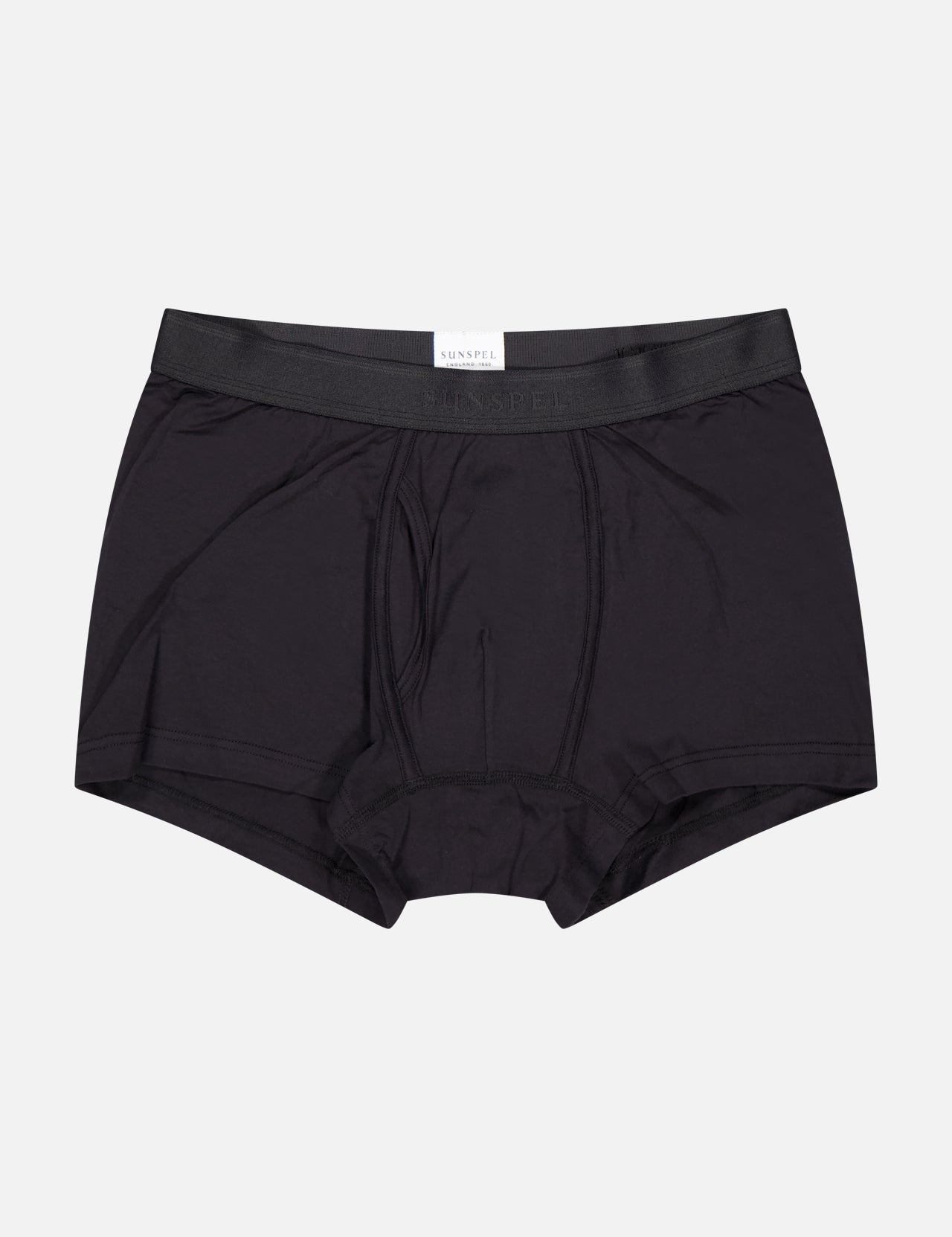 The SUNSPEL Superfine Trunk for men features black cotton jersey, a waistband, and visible seams, shown on a plain white background.