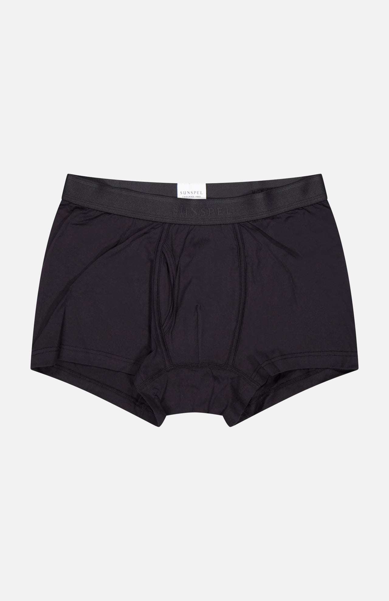 The SUNSPEL Superfine Trunk for men features black cotton jersey, a waistband, and visible seams, shown on a plain white background.