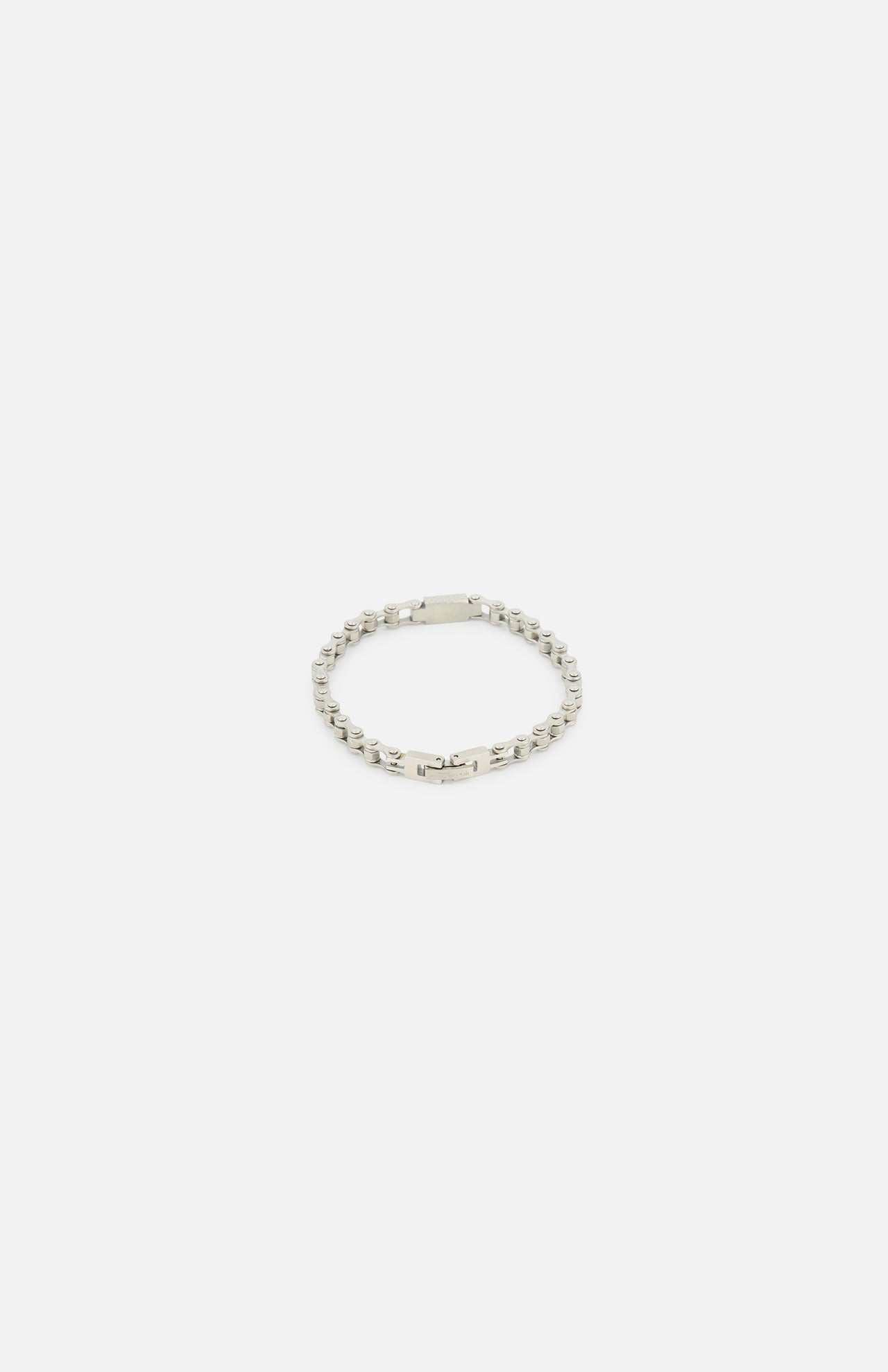 The TATEOSSIAN Bici Chain Bracelet features a sleek box link design in polished silver, displayed on a white background. This modern accessory exudes understated luxury and is ideal for elevating any style.