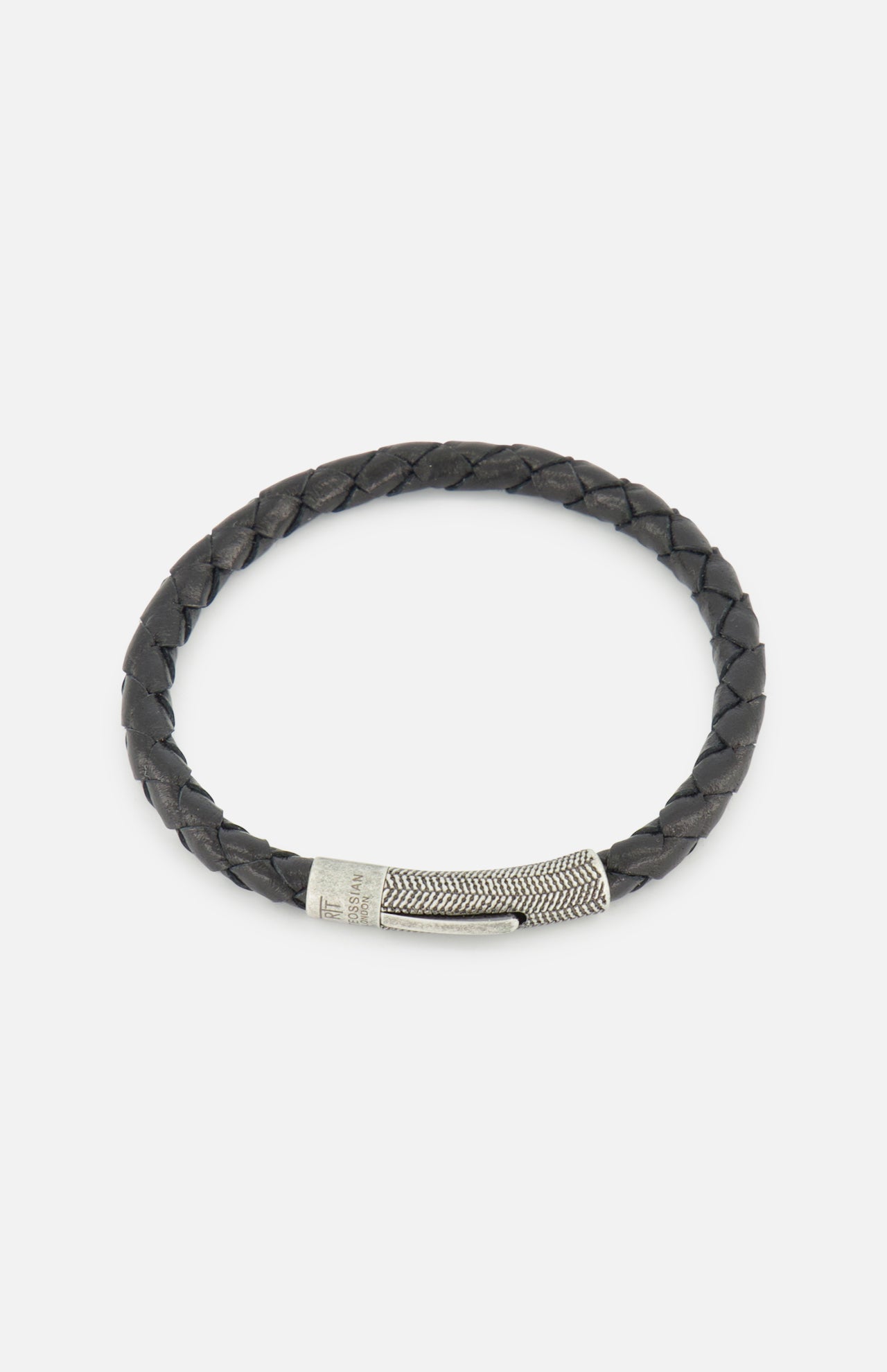 The TATEOSSIAN Vintage Herringbone Click Bracelet is a men’s luxury accessory with black braided leather and a textured stainless steel clasp, showcased elegantly on a plain white background.