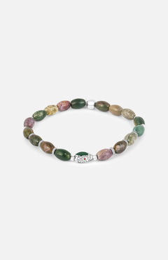 The TATEOSSIAN Indian Jasper Viper Bracelet features multicolored oval-shaped jasper stones in green, brown, and purple, finished with a silver charm and metallic clasp, displayed on a plain white background.