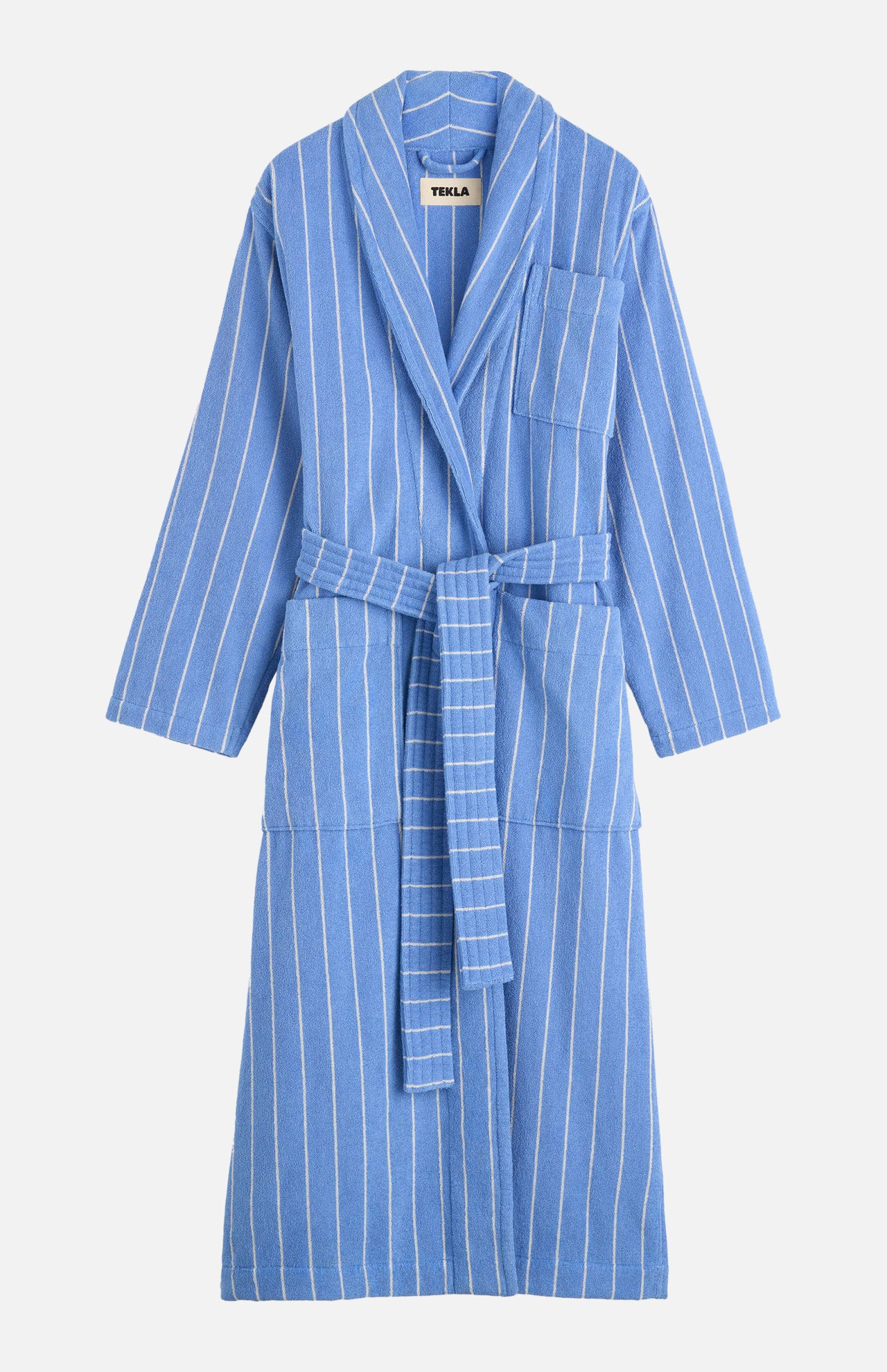 TEKLA Terry Classic Unisex Bathrobe in blue organic cotton with white vertical stripes, a waist tie, and a chest pocket.