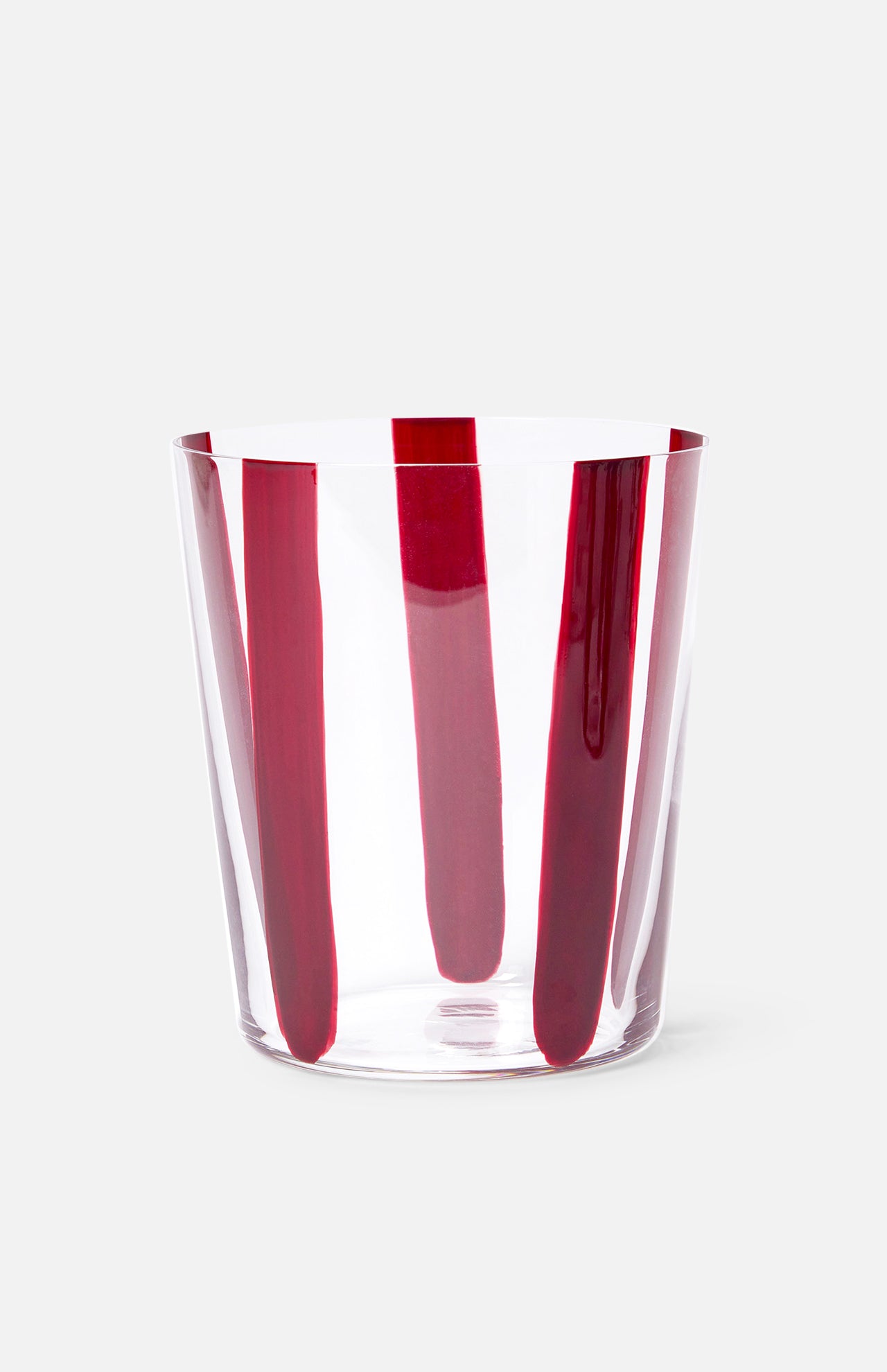 The CONRAN SHOP Nova Stripe Tumbler Set of 4 features clear crystal glasses with bold, evenly spaced red vertical stripes, shown against a light gray background.