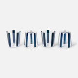 The CONRAN SHOP Nova Stripe Tumbler Set of 4 features clear crystal glasses with vertical blue stripes, stylishly arranged upright and upside down against a white background—perfect for your hand-painted glassware collection.
