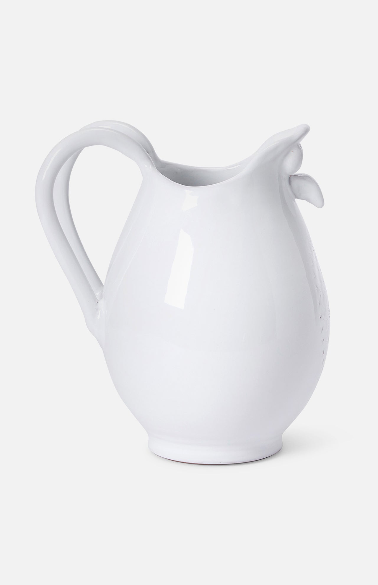 The Puglia Stoneware Bird Jug by THE CONRAN SHOP features a rounded body, curved handle, and pronounced spout in decorative white stoneware, elegantly displayed against a plain white background.