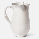 The CONRAN SHOP Puglia Jug with Plaited Handle, crafted from white stoneware in Italy, features a curved handle and spout, shown on a plain white background.