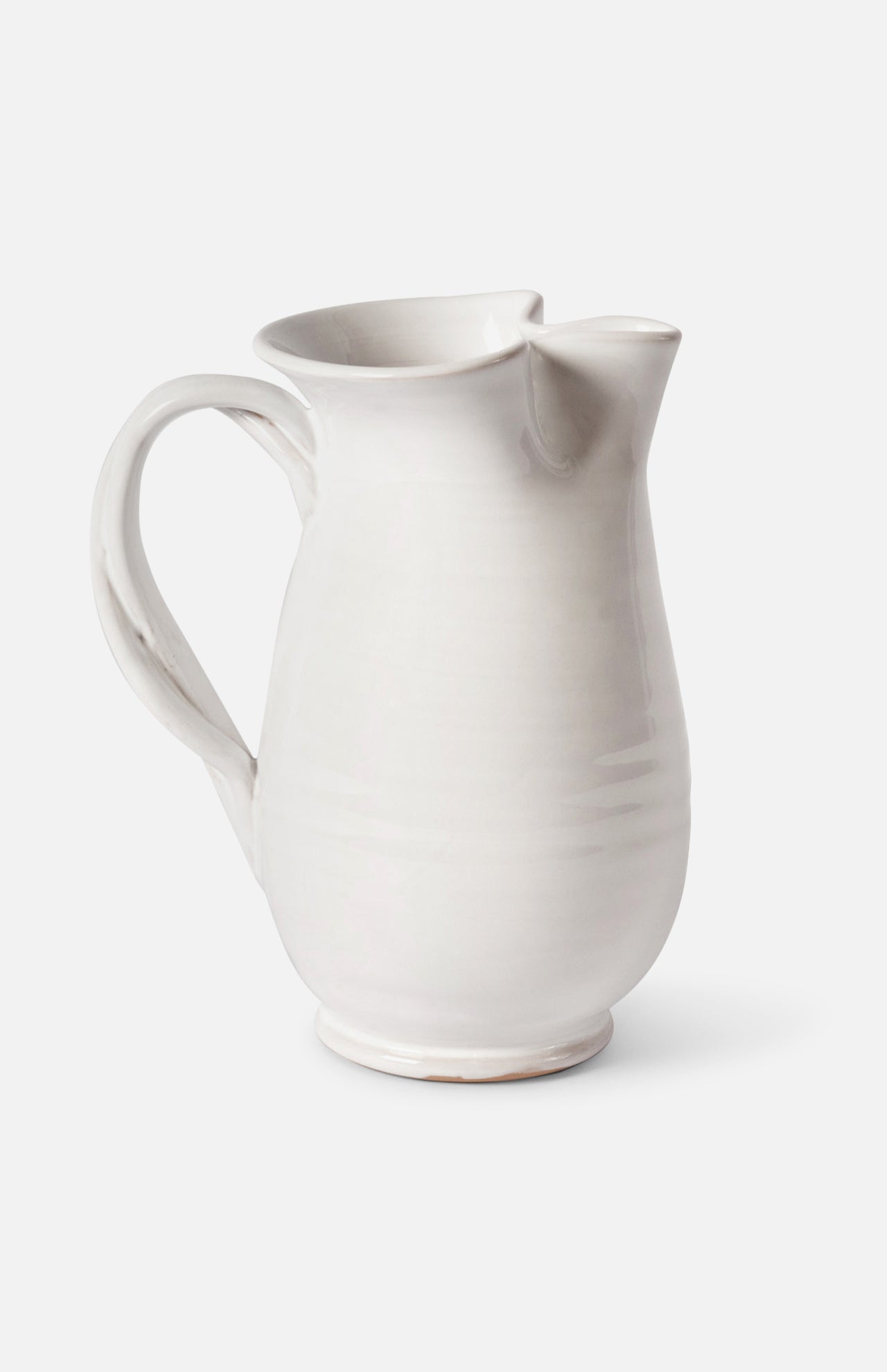The CONRAN SHOP Puglia Jug with Plaited Handle, crafted from white stoneware in Italy, features a curved handle and spout, shown on a plain white background.