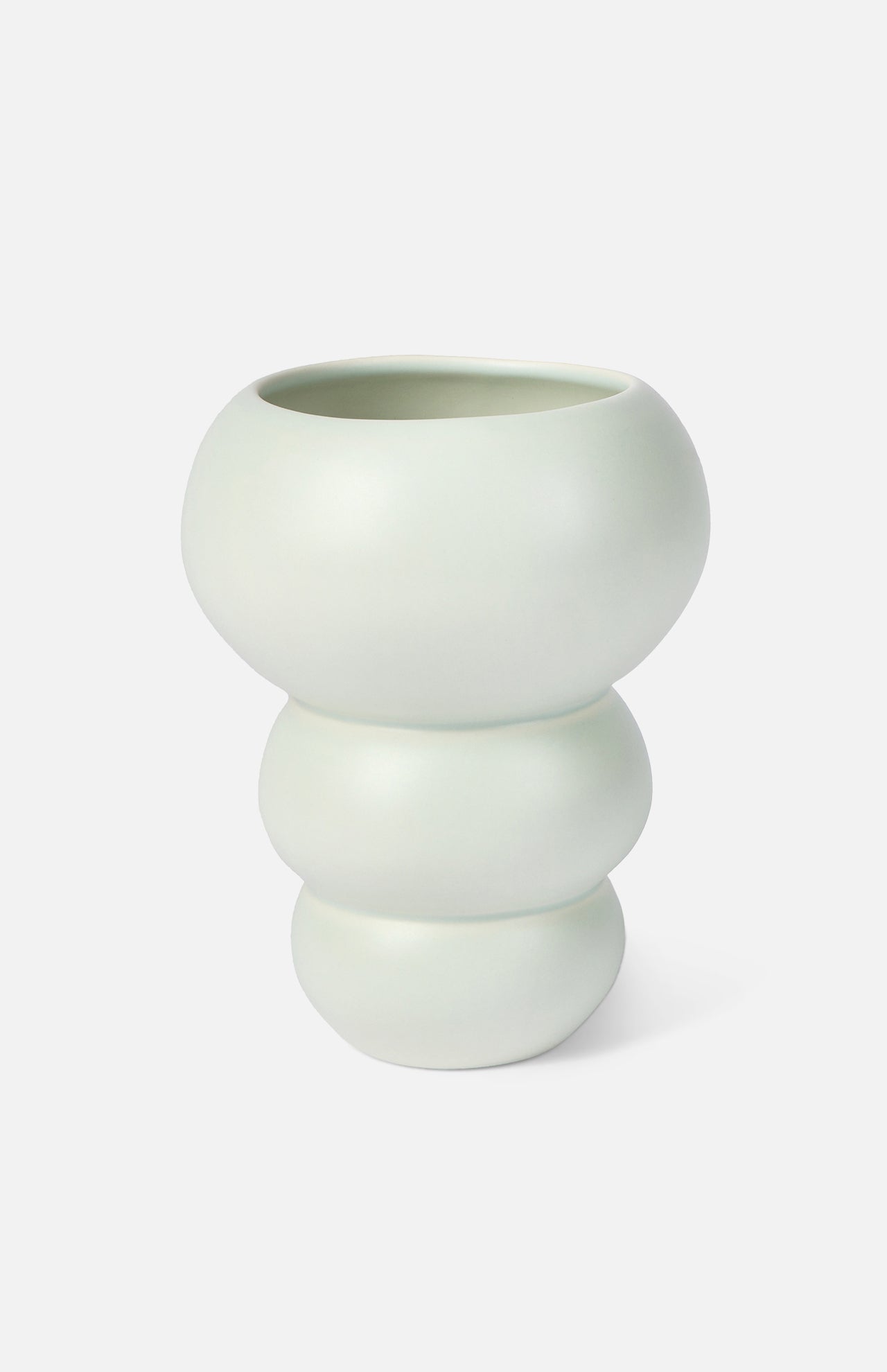 The Conran Shop's Stacked Spheres Vase Mint features a modern, matte finish with three rounded, stacked sections and a wide opening, inspired by Arjan Van Dal’s elegant forms.