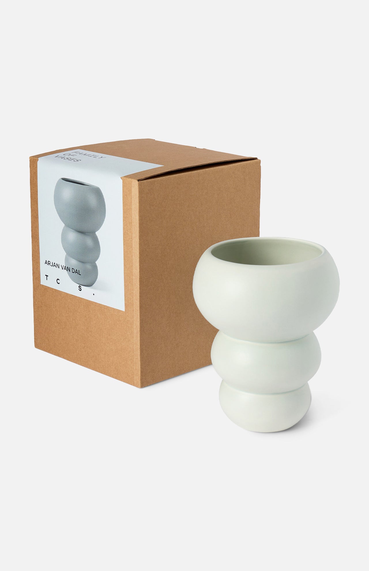 A mint, sculptural earthenware Stacked Spheres Vase by THE CONRAN SHOP with rounded, stacked bulb shapes sits beside its brown box, featuring an image and description on a white background.