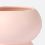 Close-up of THE CONRAN SHOP's Stacked Spheres Vase Plaster, a smooth, round earthenware vase in pale pink with a wide opening and soft matte finish, set against a plain light background.