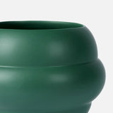 A close-up of THE CONRAN SHOP's Tree Vase Forest Green, featuring a rounded, bulbous matte silhouette and smooth finish, set against a plain white background.