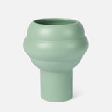 The Tree Vase Sage Green by THE CONRAN SHOP is a modern earthenware piece with a matte finish, featuring a cylindrical base and rounded midsection, showcased against a plain white background.