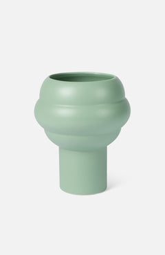 The Tree Vase Sage Green by THE CONRAN SHOP is a modern earthenware piece with a matte finish, featuring a cylindrical base and rounded midsection, showcased against a plain white background.