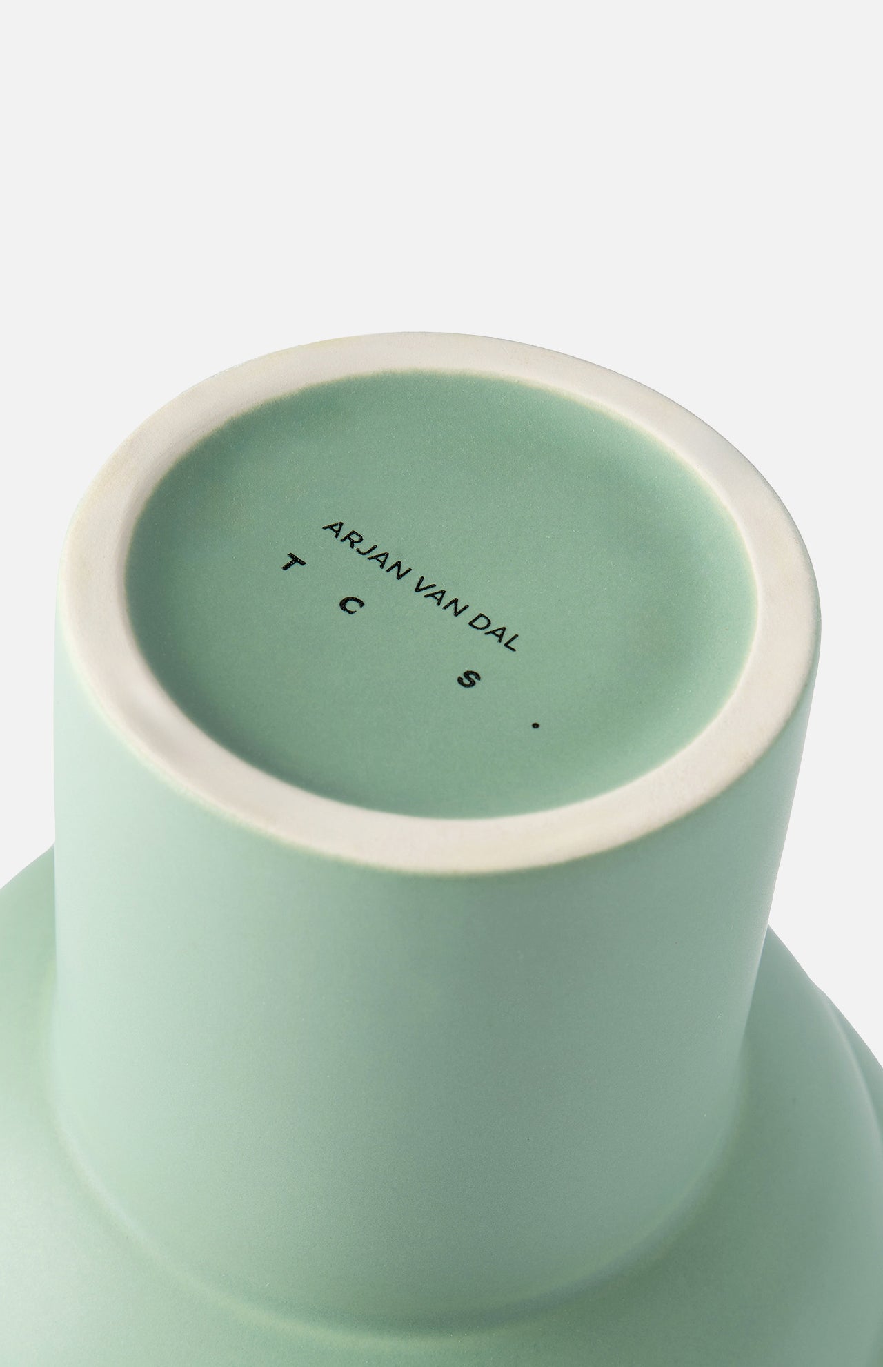 The base of a Tree Vase Sage Green by THE CONRAN SHOP is shown, featuring its name and branding printed in black text.