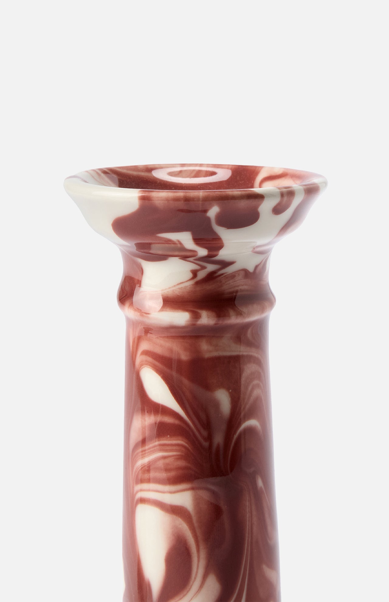 The Marbled Wardour Candlestick by THE CONRAN SHOP features a wide, flared rim and a hand-marbled red and white glaze set against a plain white background.