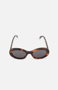 CELINE Oval Tortoiseshell Brown Sunglasses with dark lenses exude luxury French fashion flair, shown against a plain white background.
