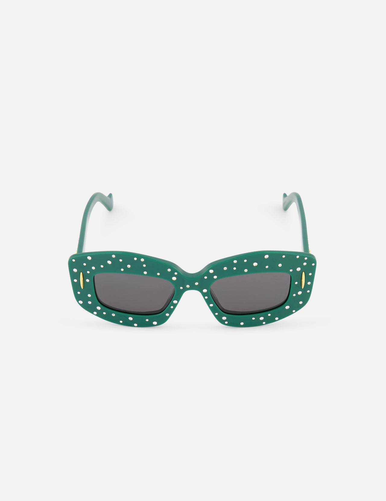 The LOEWE Rectangle Sequin Green Sunglasses feature a chic cat-eye design, dark green rectangle frames with white polka dots, dark lenses, and gold accents, shown against a plain white background.