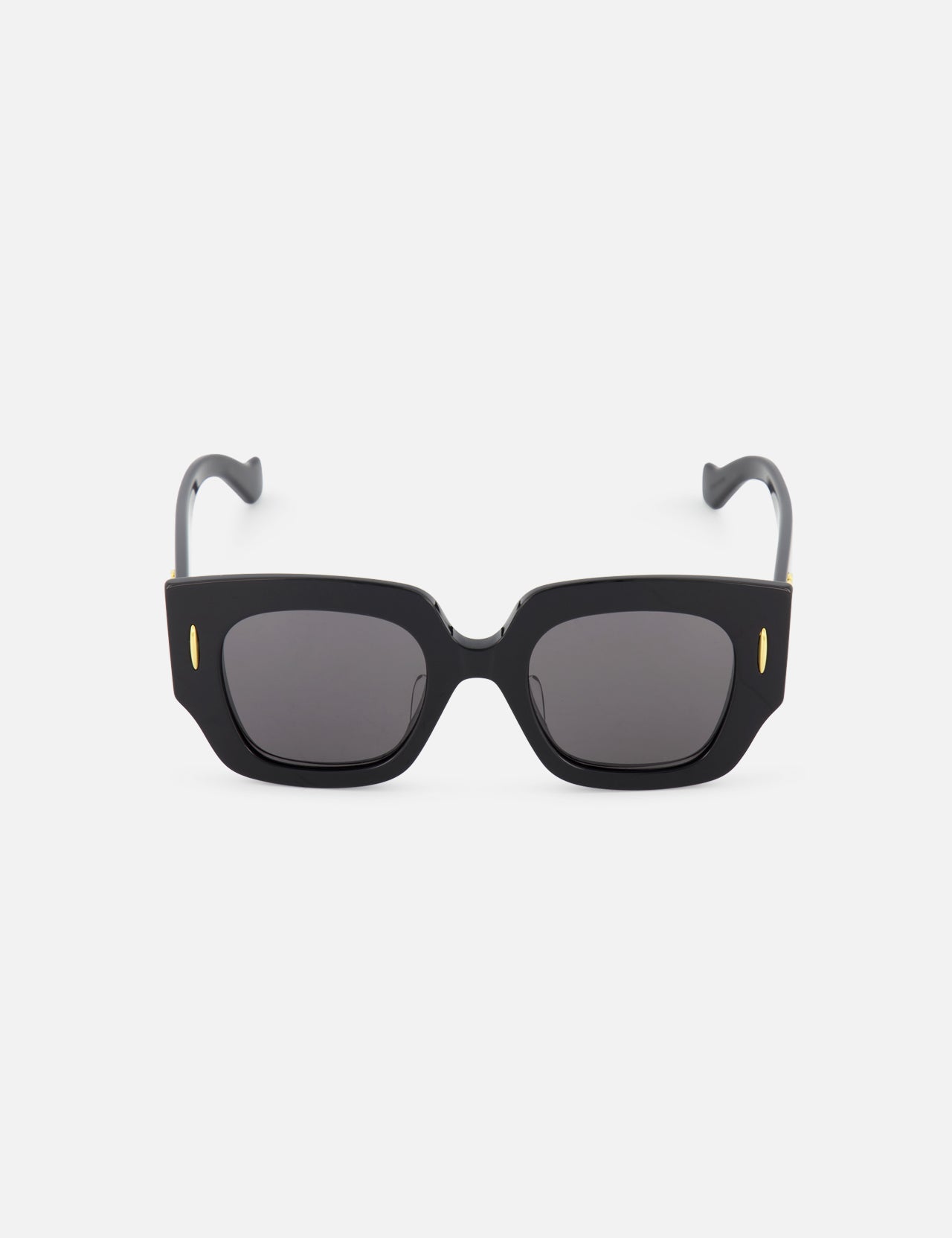 LOEWE's Loewe Oversized Square Black Sunglasses feature oversized square frames, dark lenses, and gold oval accents on the front corners, shown against a plain white background.