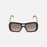The CELINE Aviator Black Sunglasses feature a sleek rectangular design with brown gradient lenses, shown facing forward on a white background—a chic tribute to luxury French fashion.