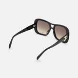 The Celine Aviator Black Sunglasses by CELINE are shown from the back, featuring black square frames with brown gradient lenses and metallic accents on the arms, all set against a plain white background.