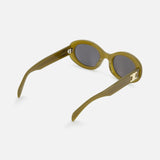 CELINE Oval Green Sunglasses with dark lenses, thick olive green frames, and gold logo accents inspired by the luxury French fashion house are displayed against a plain white background.