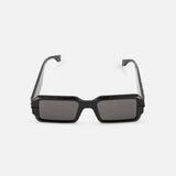 The FENDI Rectangular Black Sunglasses feature thick frames and dark grey lenses, offering a bold statement style.