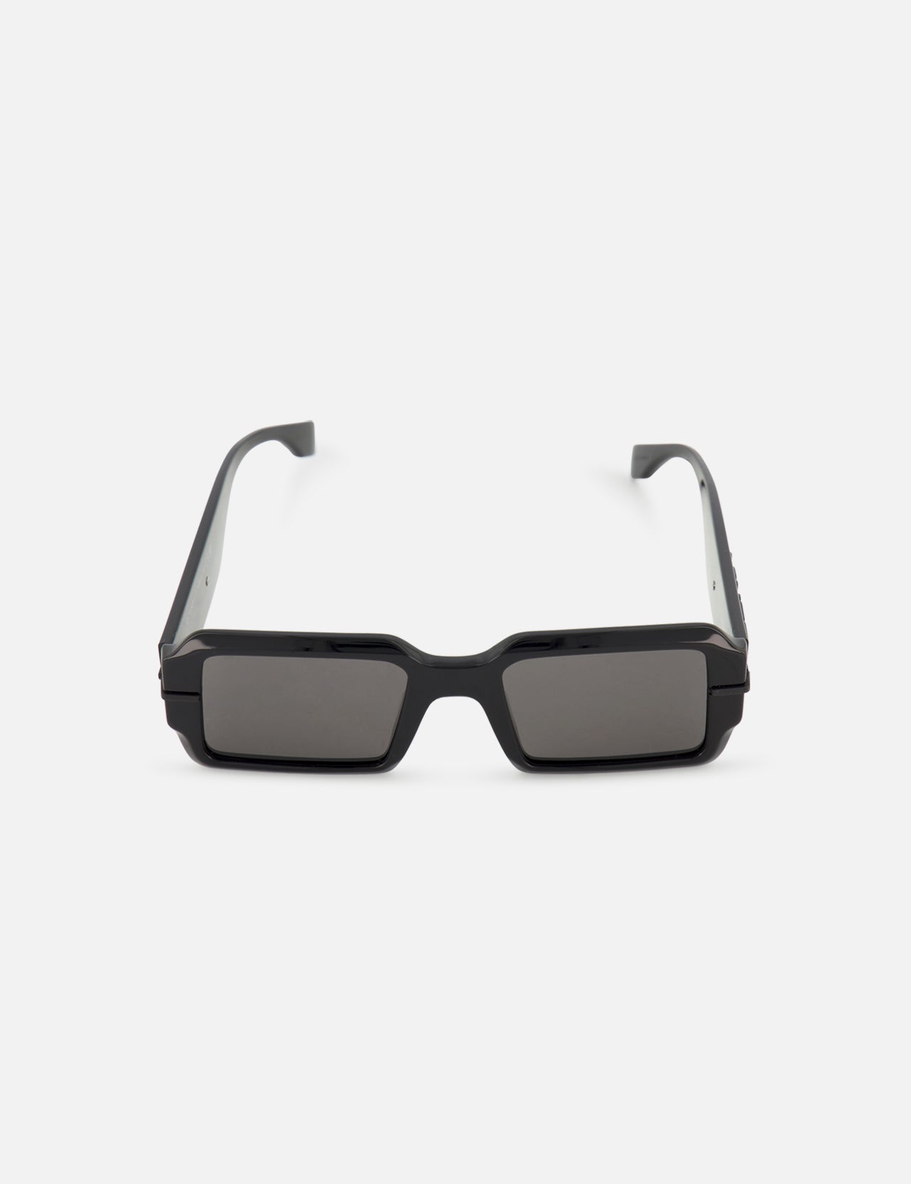 The FENDI Rectangular Black Sunglasses feature thick frames and dark grey lenses, offering a bold statement style.