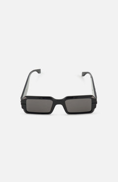 The FENDI Rectangular Black Sunglasses feature thick frames and dark grey lenses, offering a bold statement style.