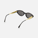 Fendi Cat Eye Black Sunglasses by FENDI feature gold arms, the iconic logo on the sides, a sleek modern design, and dark lenses for a chic look.