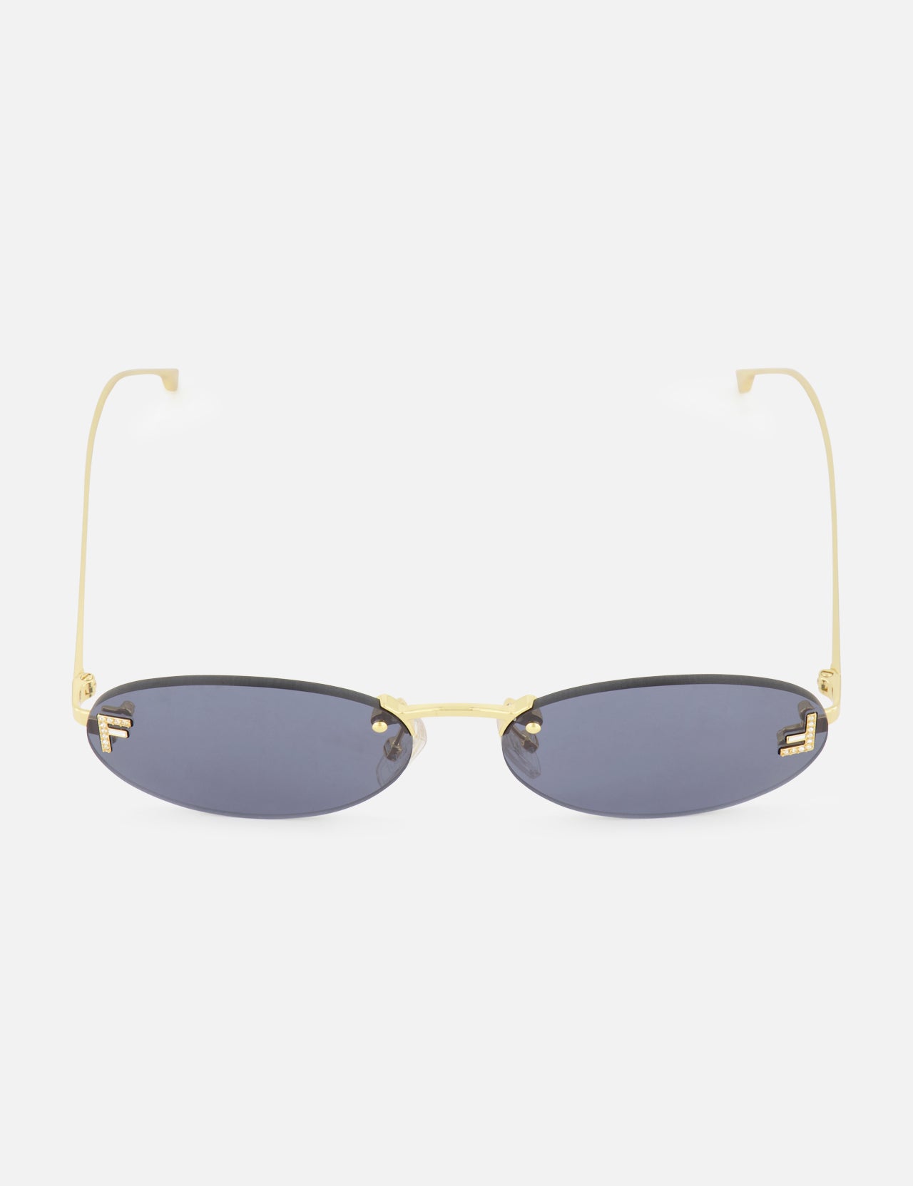 Fendi Oval Gold Sunglasses by FENDI, featuring dark lenses and thin gold frames with subtle gold Fendi lettering on the arms, shown from the front against a white background.
