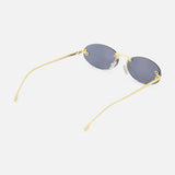 The Fendi Oval Gold Sunglasses by FENDI feature gold-rimmed oval frames with dark lenses and subtle gold FENDI lettering along the arms. Shown on a white background with the arms extended, these statement sunglasses are perfect for any occasion.