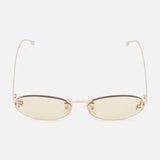 The FENDI Oval Rose Gold Sunglasses feature thin, rose gold metal frames and light yellow-tinted lenses, displayed against a plain white background.