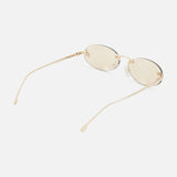 The Fendi Oval Rose Gold Sunglasses by FENDI feature oval frames with light gold-tinted lenses and slender rose gold metal arms, showcased against a white background.