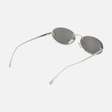 FENDI Oval Silver Sunglasses with thin silver metal frames and dark lenses, displayed on a white background. These designer sunglasses by Fendi feature slightly curved arms that extend backward, combining timeless style with modern sophistication.