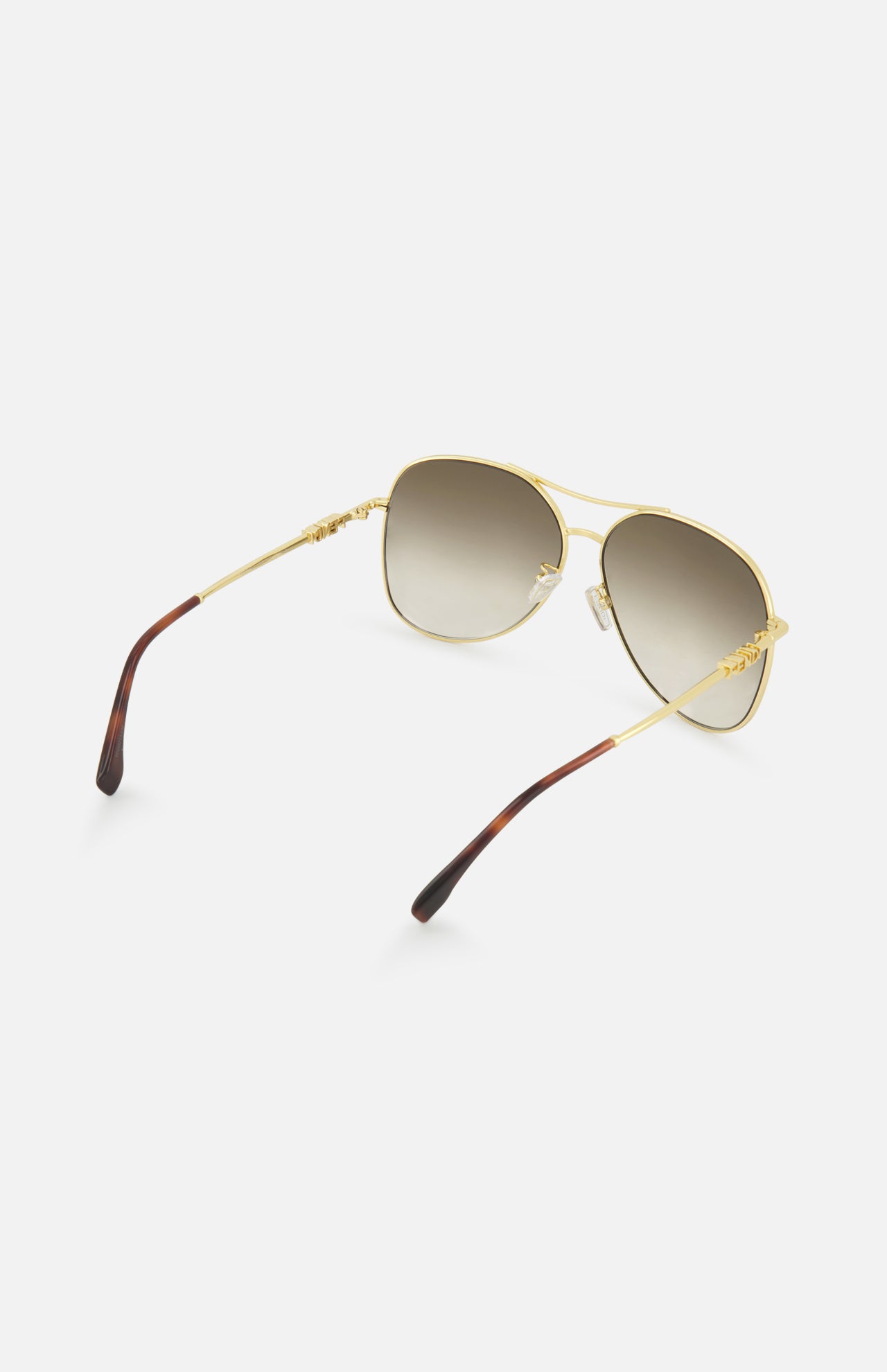 FENDI Aviator Gold Sunglasses with gradient lenses and brown-tipped arms, showcased on a white background.