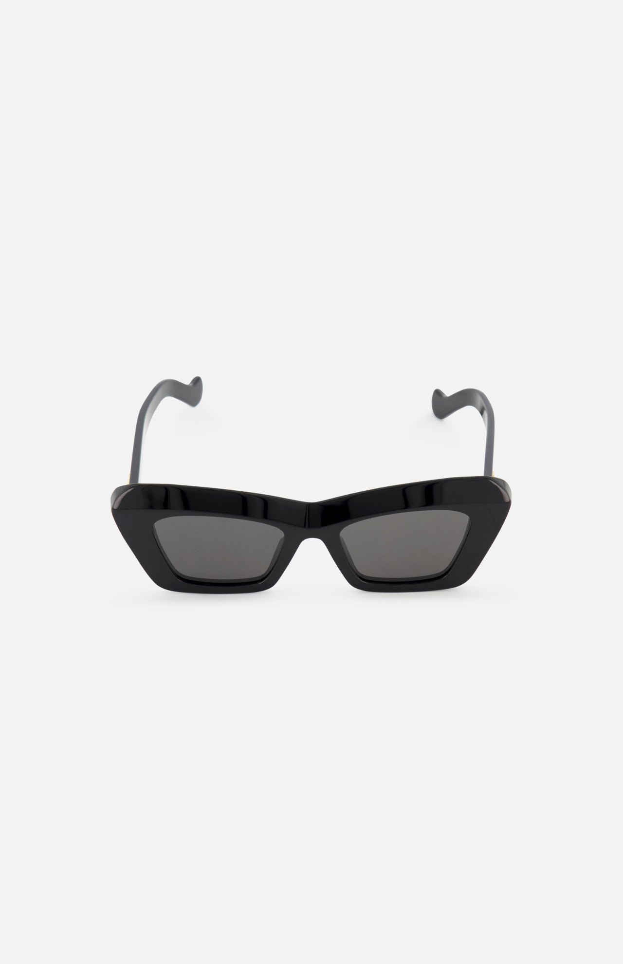 The LOEWE Cat Eye Black Sunglasses feature bold, angular acetate frames and dark lenses for a modern look. Shown front-facing against a white background, these designer sunglasses highlight the brand's sleek style.