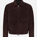 The THEORY Aviator Lamb Leather Jacket features dark brown lamb leather, a front zipper, two large flap chest pockets, a straight collar, and long sleeves. This men's jacket is shown against a plain white background.