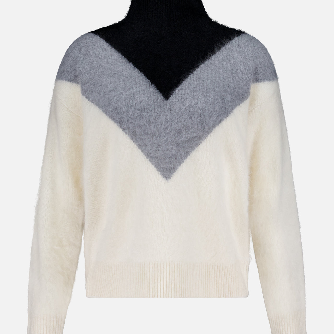 The THEORY Cashmere Chevron Yoke Sweater features a fuzzy, long-sleeve design with a high black collar, black upper chest, gray chevron V-shape midsection, and cream white sleeves and lower body.