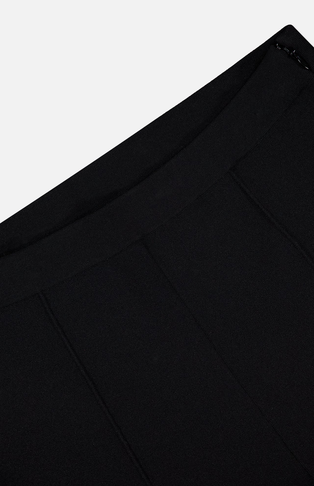Close-up of the waistband and upper section of THEORY's Compact Cropped Kick Pant in black, highlighting smooth fabric and subtle seam details—an ideal modern office choice against a white background.