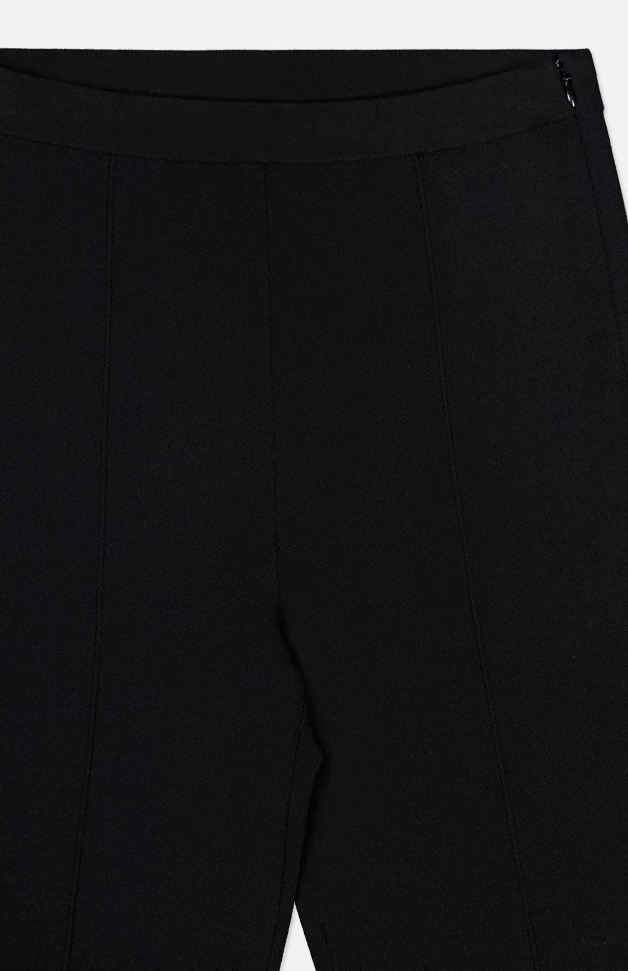 Close-up of the THEORY Compact Cropped Kick Pant’s top half, showcasing a side zipper and front seam details—ideal for chic office looks—set against a plain white background.