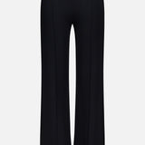 The THEORY Compact Cropped Kick Pant features a high waist, wide legs, and front seam detailing in black—ideal for office wear—shown against a plain white background.