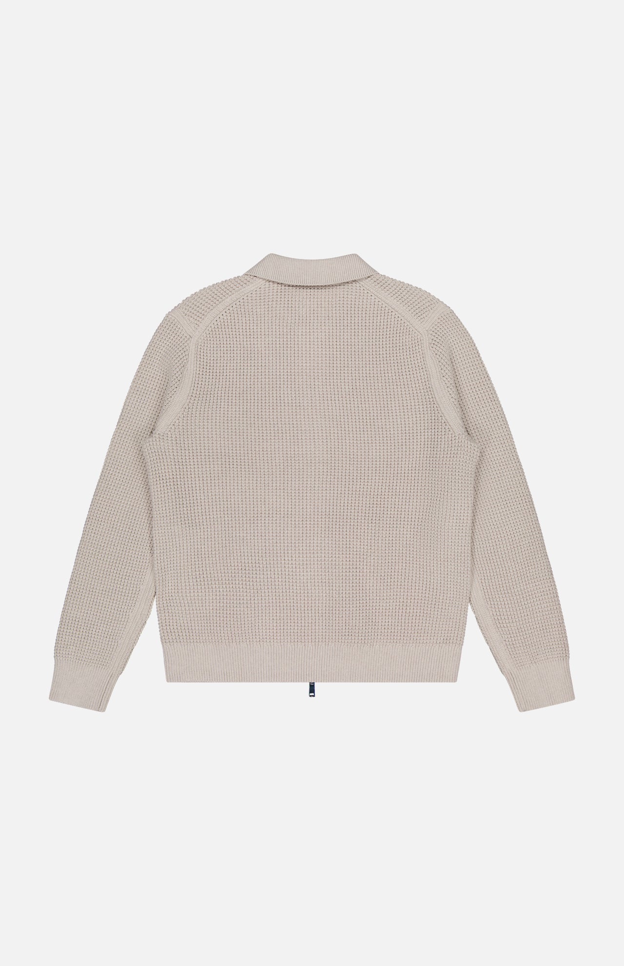The THEORY Gary Zip Sweater Jacket, shown from the back on a white background, is beige with long sleeves, a ribbed texture, collar, zip front, and ribbed cuffs and hem. Crafted from a cotton-cashmere blend.
