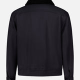Back view of a dark blue Theory Aviator Double Face Jacket with a black faux-shearling collar and a banded waist.