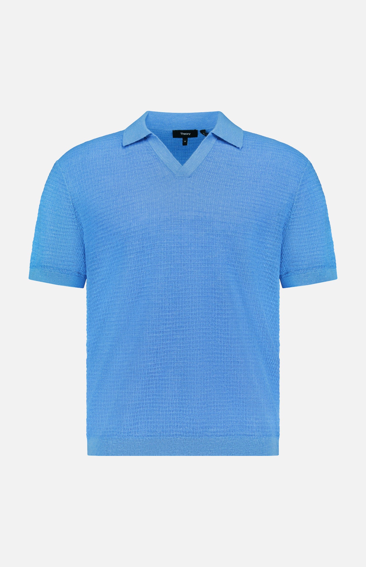 The THEORY Brenan Knit Johnny Collar Polo Shirt is light blue, crafted in a textured linen-blend with short sleeves, a Johnny collar, and V-neck. Displayed on a plain white background.