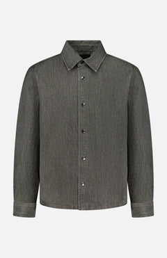 The THEORY Denim Snap-front Overshirt is a long-sleeve, button-up shirt jacket crafted from faded dark gray stretch-cotton denim. Featuring a pointed collar, chest pocket, and a simple, clean design, it serves as an ideal lightweight jacket for versatile layering.