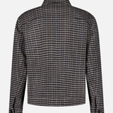 A back view of the THEORY Double Face Wool Short Jacket, a long-sleeved men’s outerwear piece with a collared neckline and a classic black and gray plaid check pattern. This dark brown jacket features buttoned cuffs and a straight hem, offering timeless style.